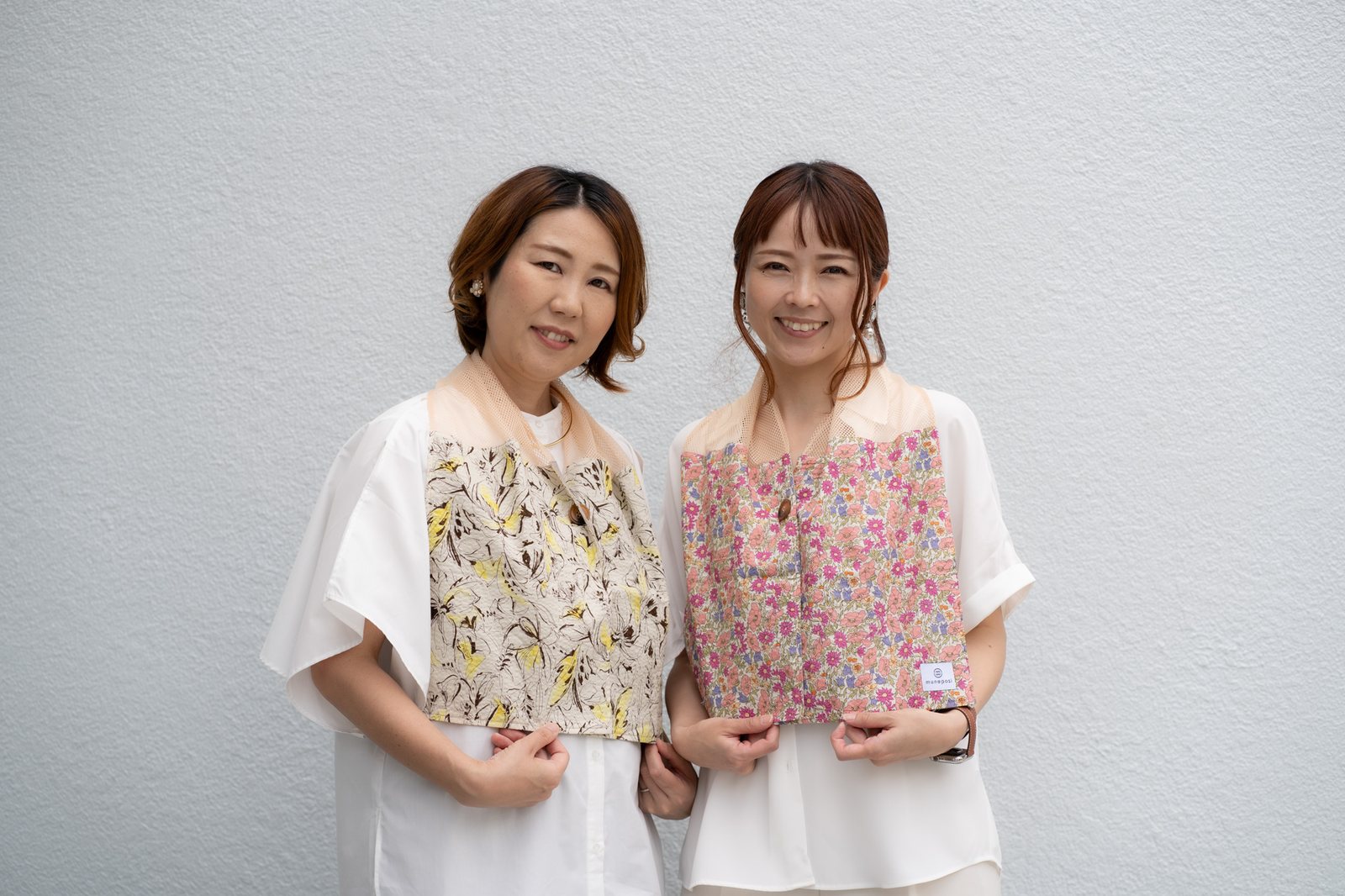 muneposiタオルを首から掛けたふたり